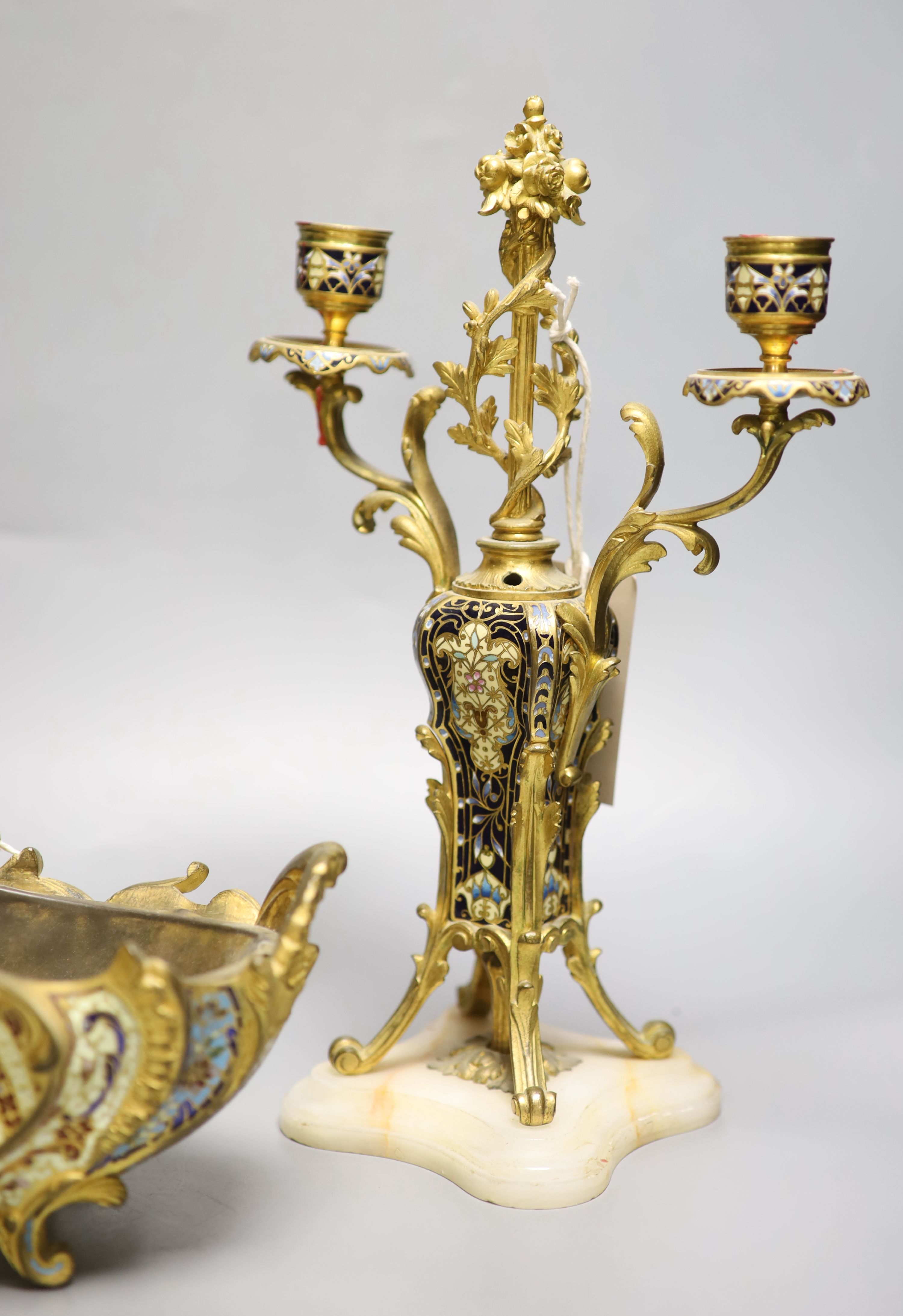 A pair of champleve enamel and alabaster candelabra, height 28cm and a similar jardiniere